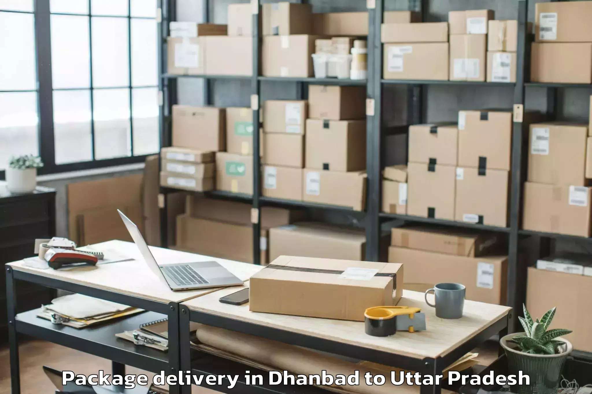 Reliable Dhanbad to Ramkola Package Delivery